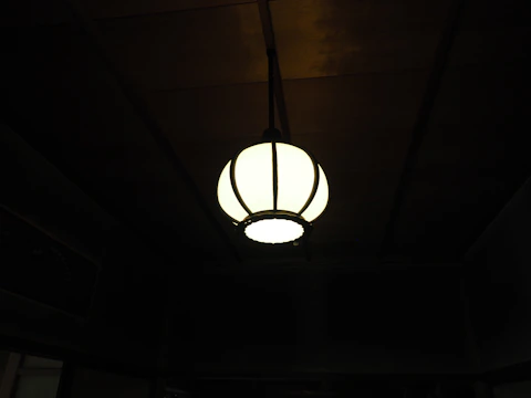 PVC ceiling installation in a cozy family room with warm lighting
