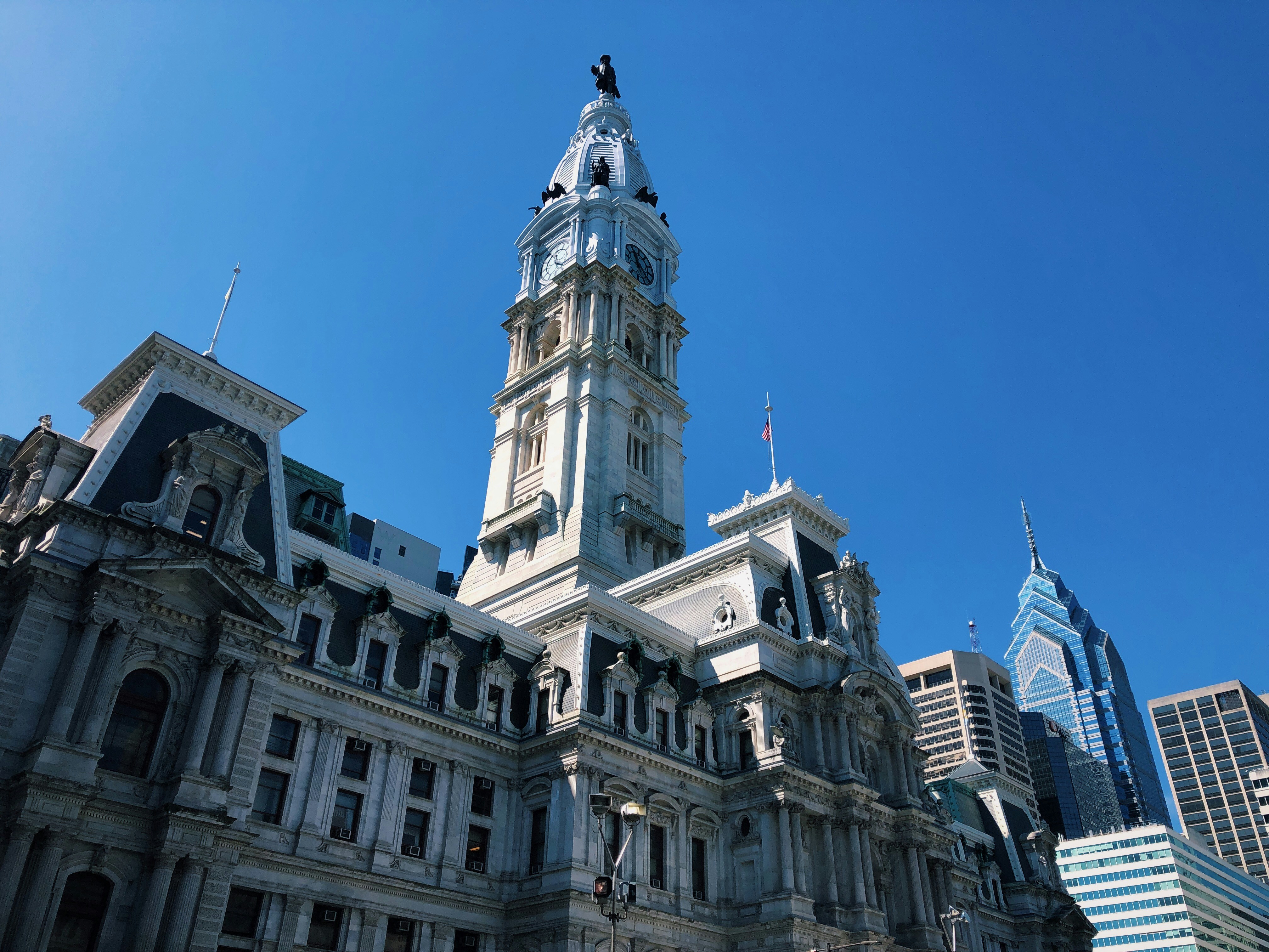 low-angle photography of gray concrete building with tower