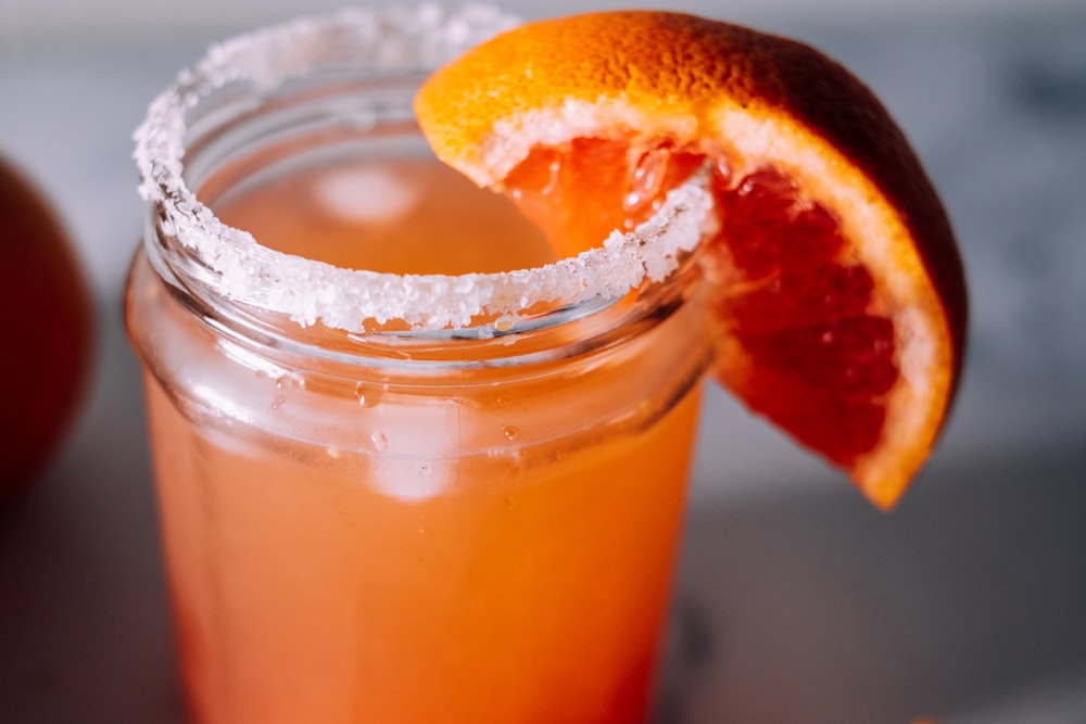 orange juice in glass jar