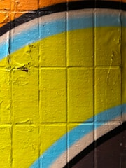 A vibrant wall mural showcasing bold graphics in an office.