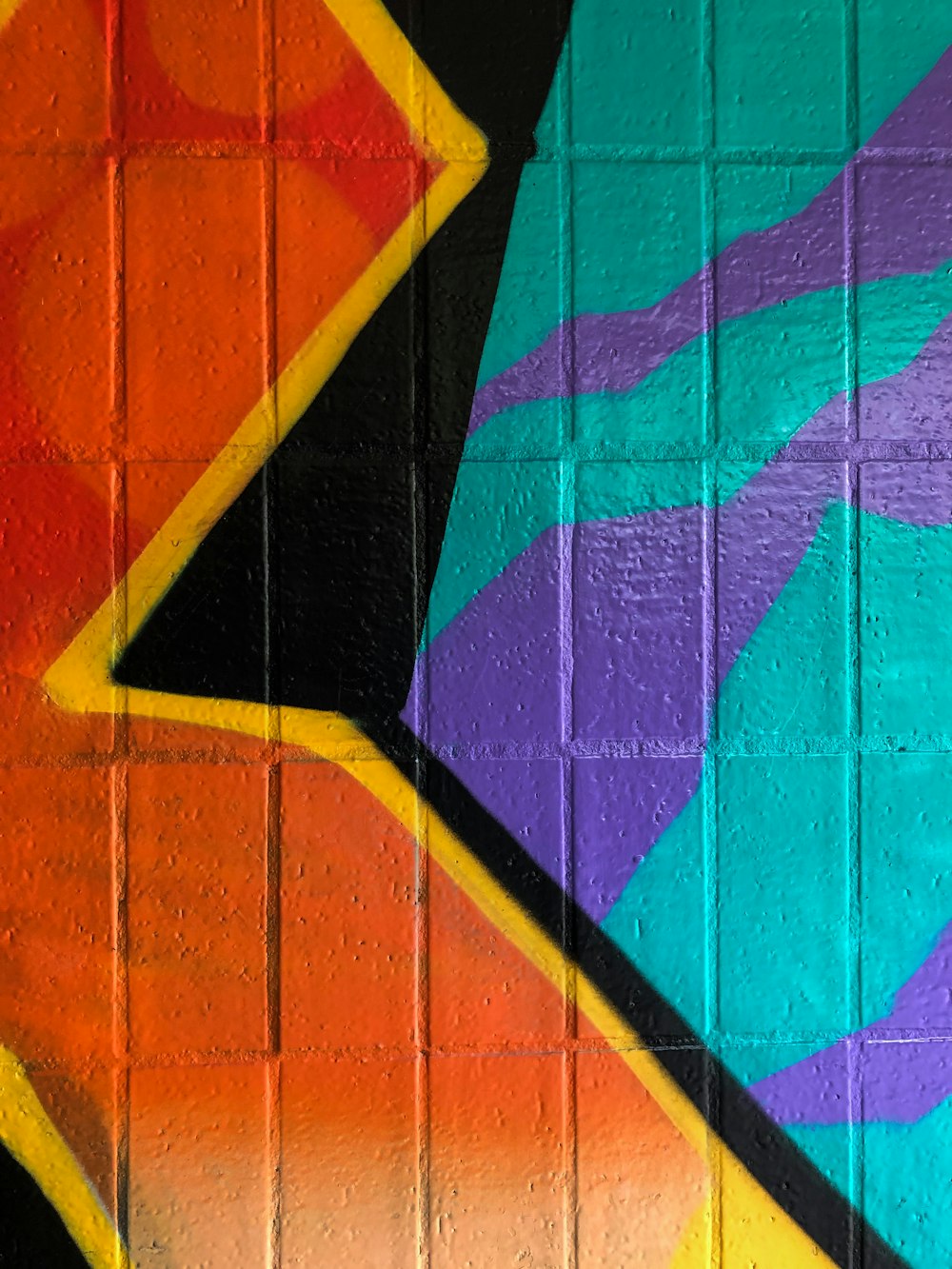 a close up of a painting on a wall