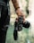 person holding black DSLR camera