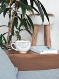 white mug on brown table