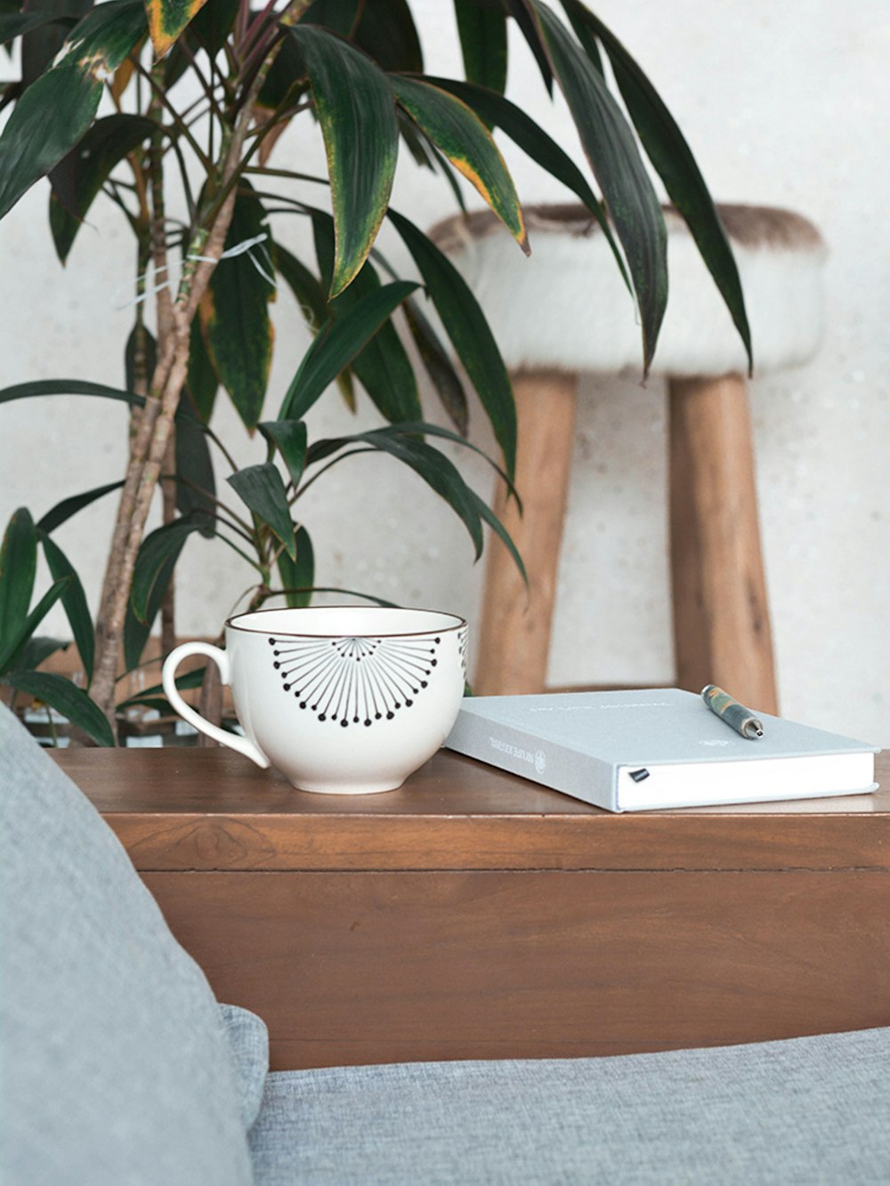 white mug on brown table