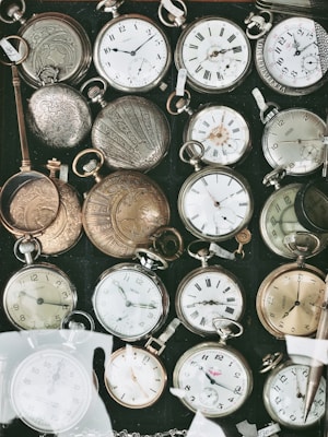 assorted-color pocket watches