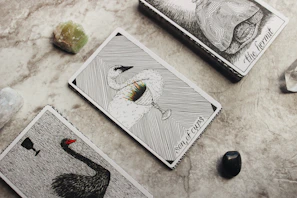 three assorted cards