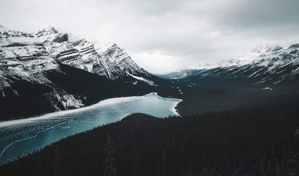 body of water near mountain