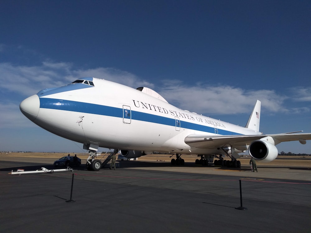 white and blue airliner