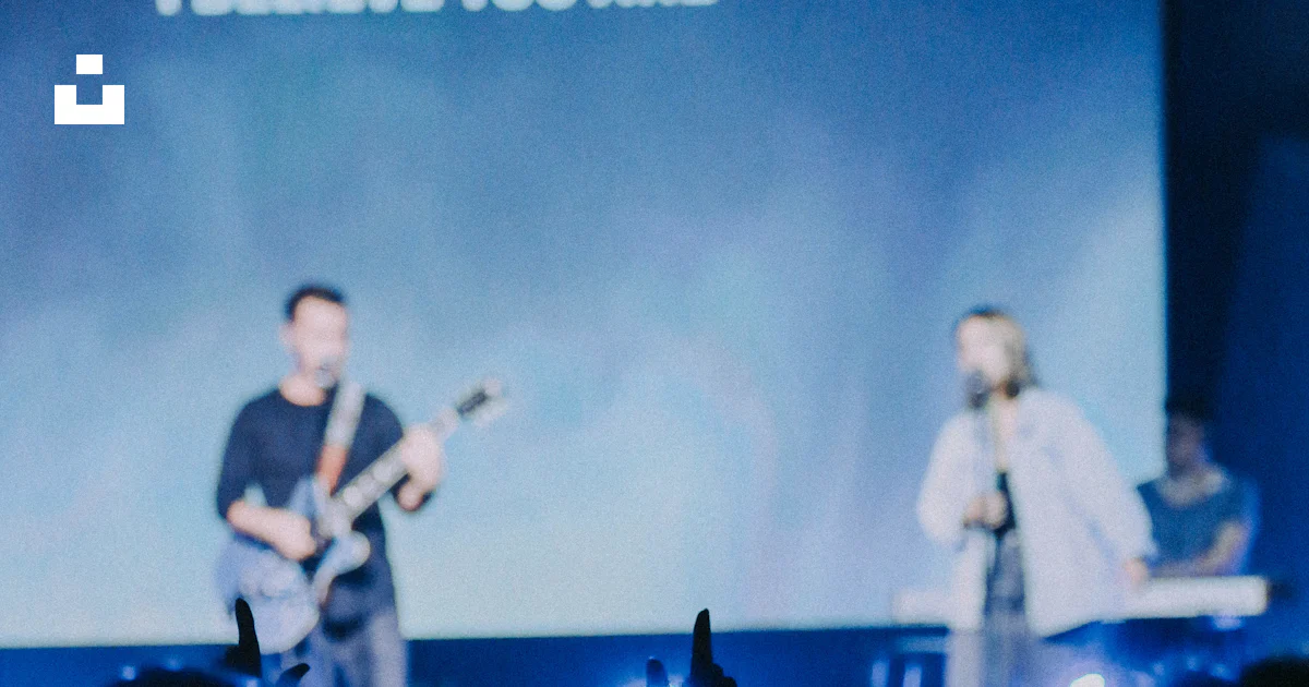 Two people singing in stage photo – Free Blue Image on Unsplash