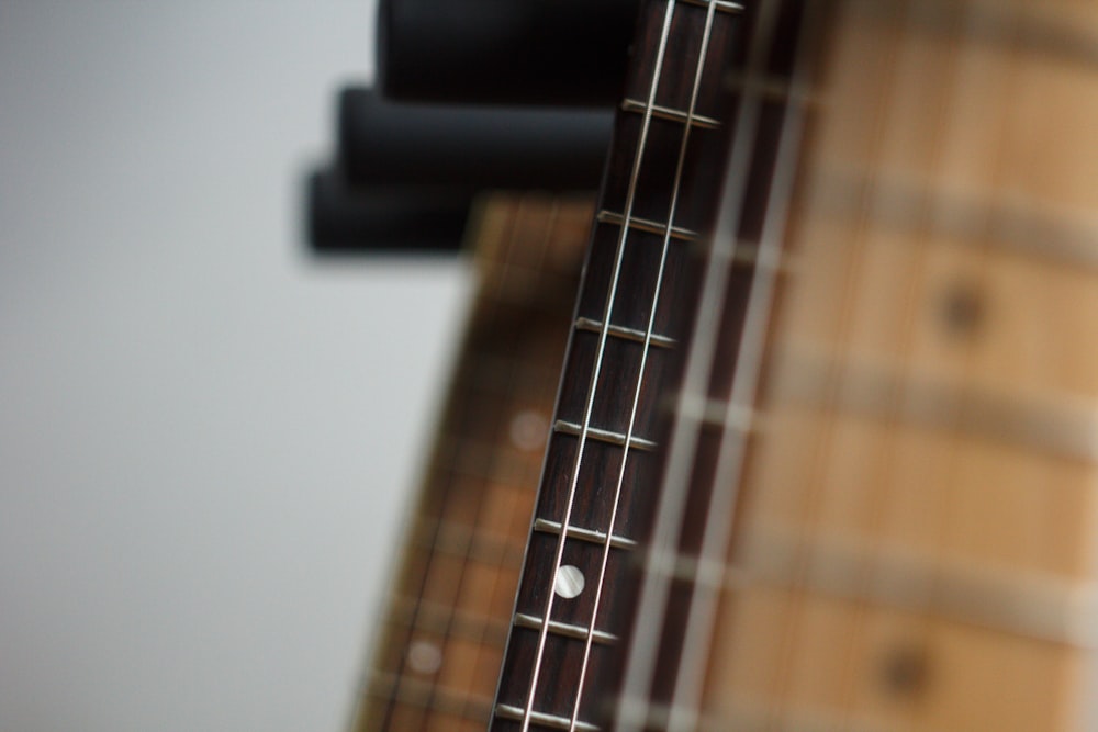 brown and black guitars