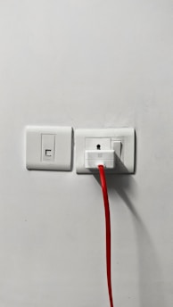 A user interacting with a smart plug device.