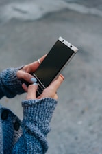 person holding smartphone