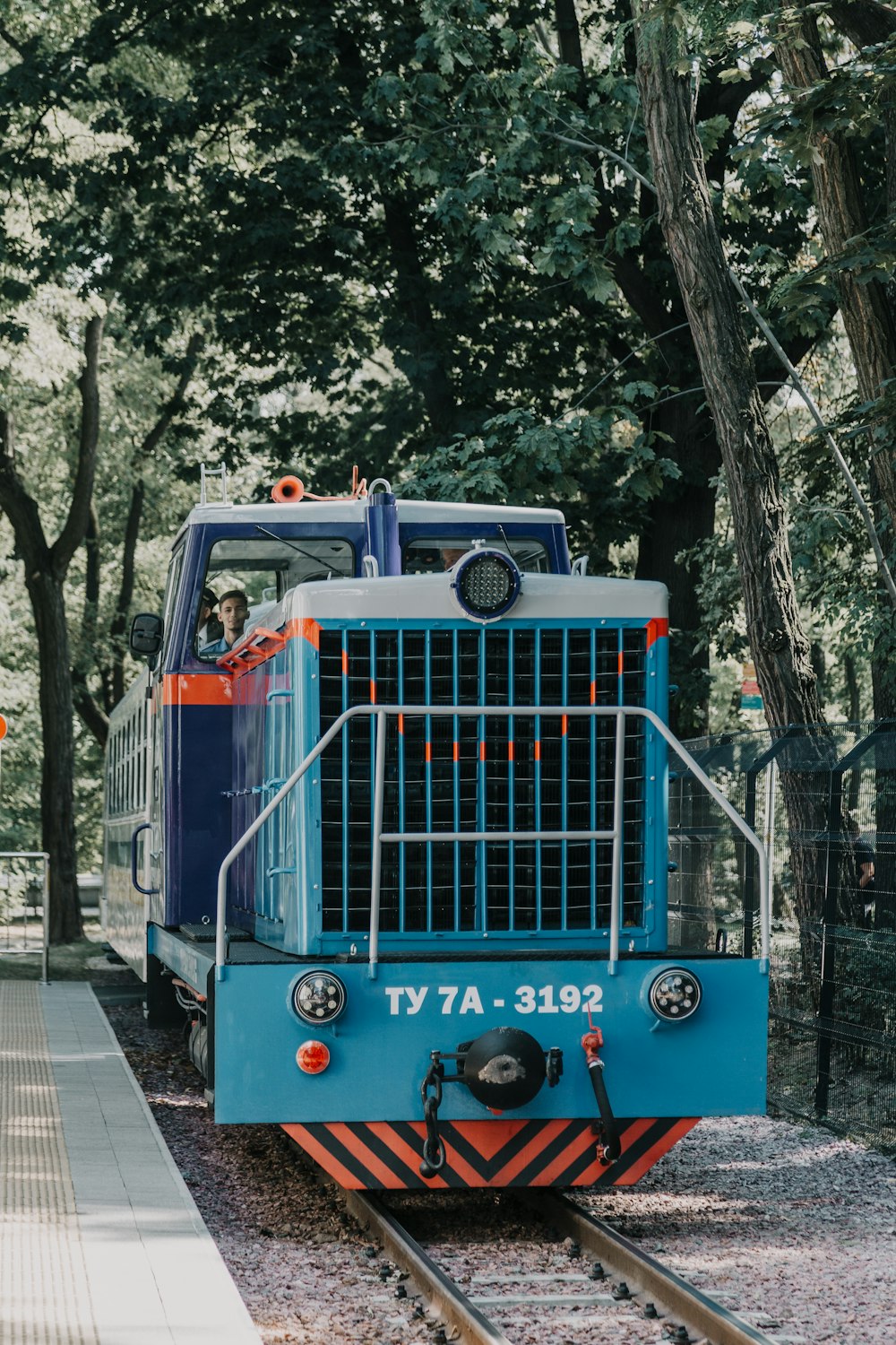 photo of blue charcoal train
