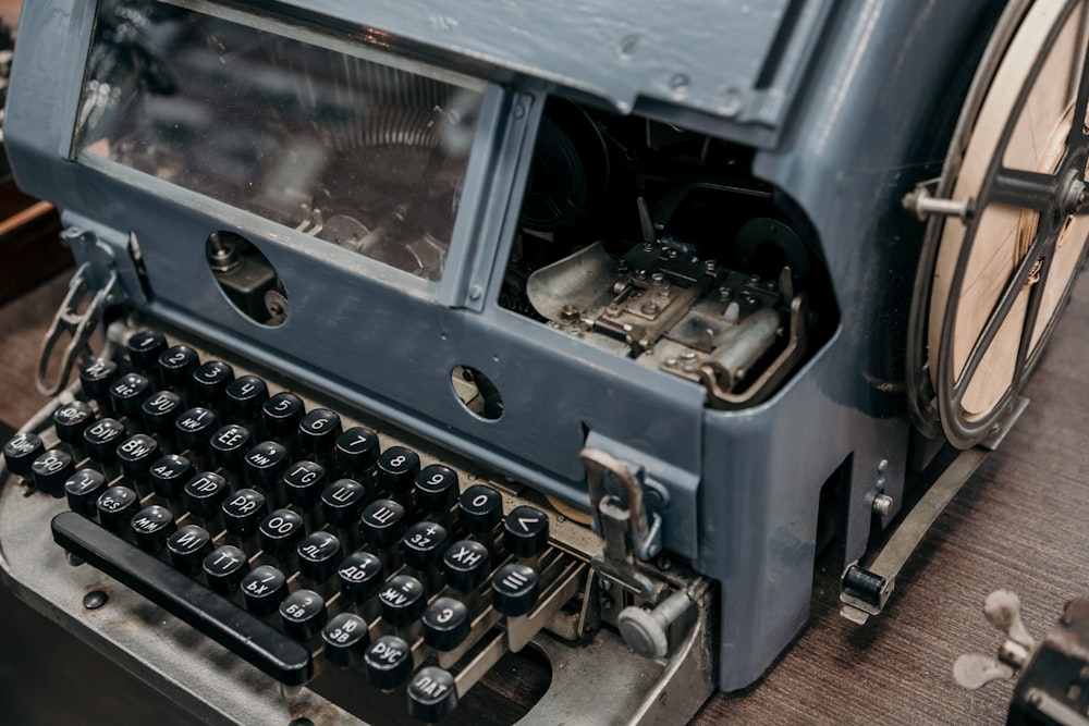 blue and black typewriter