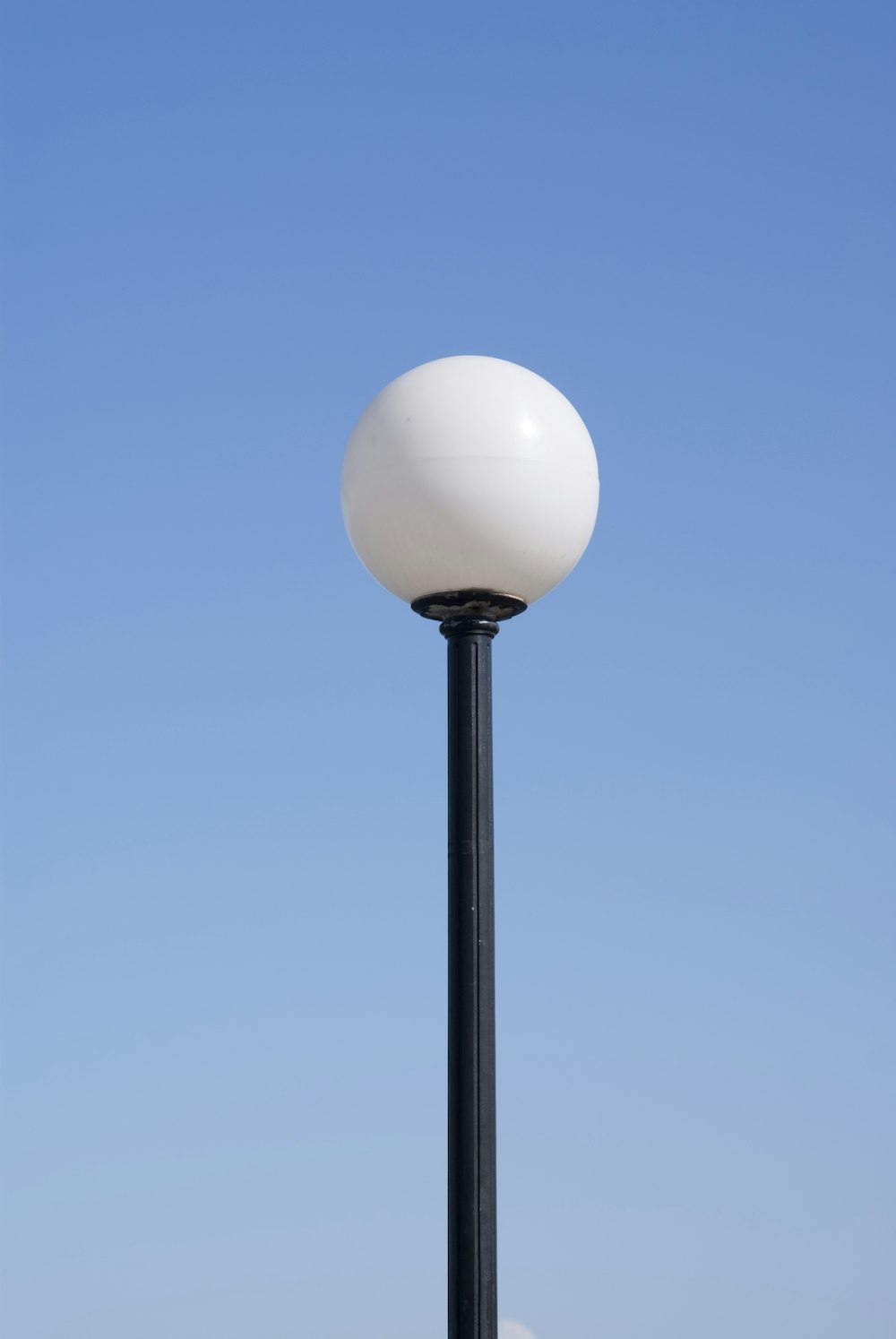 photo of white and black LED post lamp
