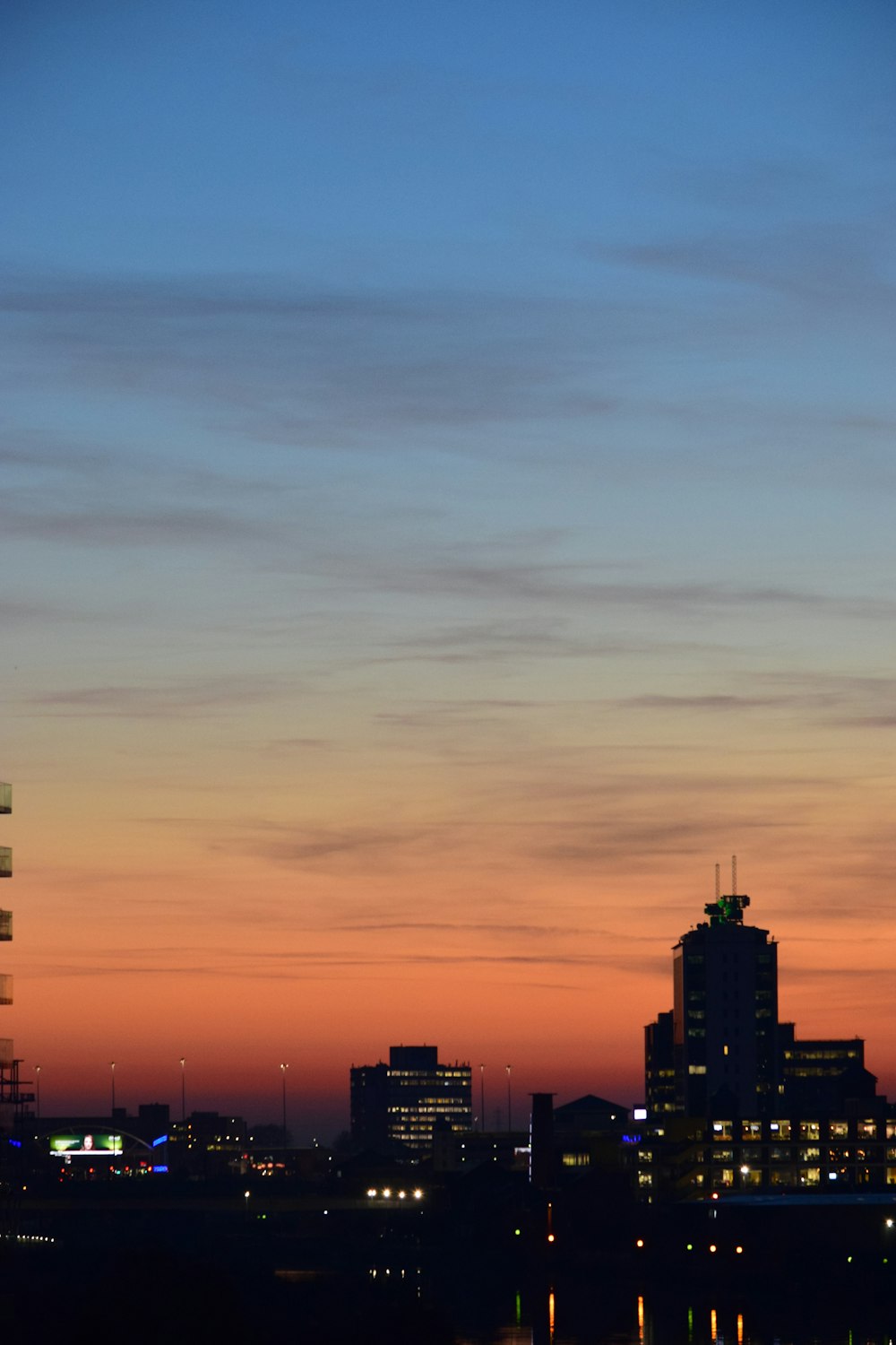 lighted buildings during golden hour