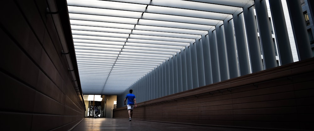 man walking inside building