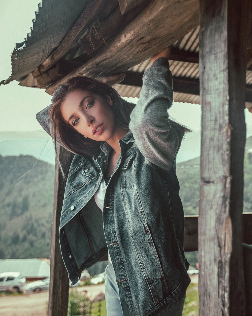 woman wearing blue denim jacket