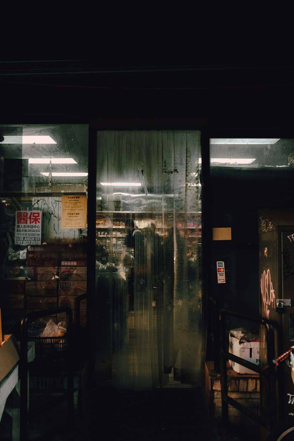 boxes inside building with glass windows