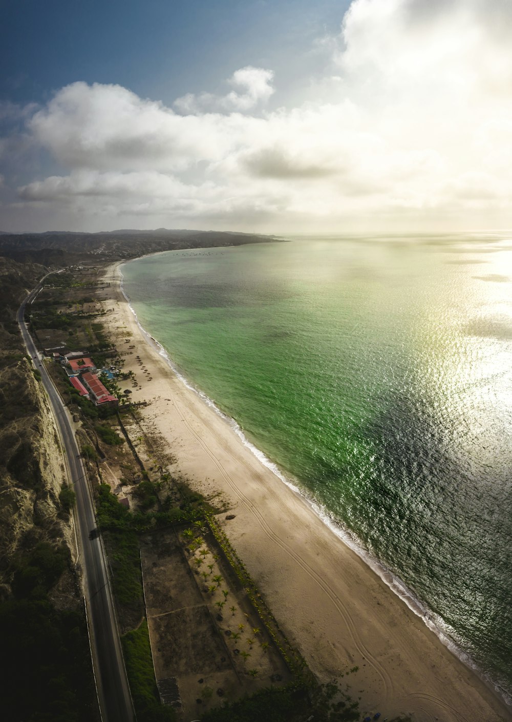 aerial photography of a white sand beach line