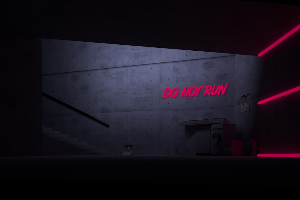 Do Not Run text on gray wall