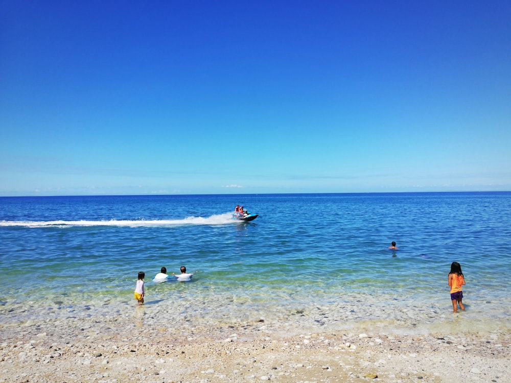 children on shore