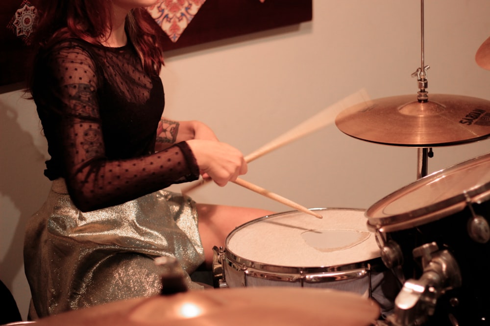person playing drum