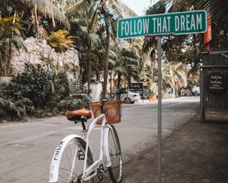 parked white bicycle