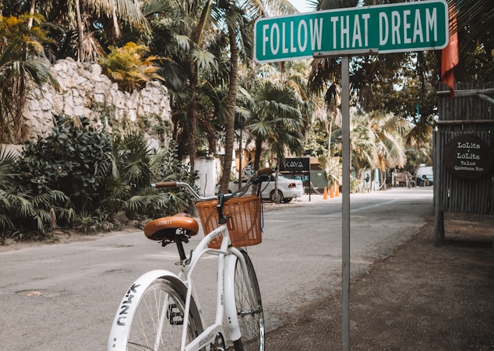 parked white bicycle