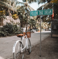 parked white bicycle