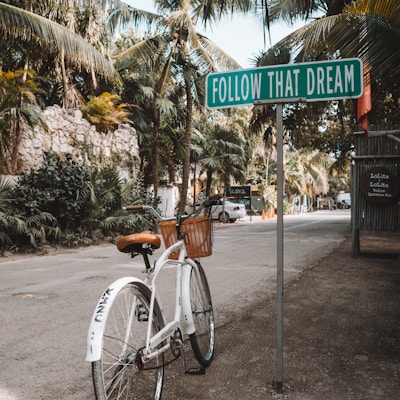 parked white bicycle