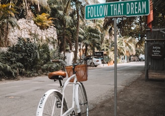 parked white bicycle