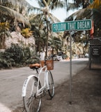 parked white bicycle