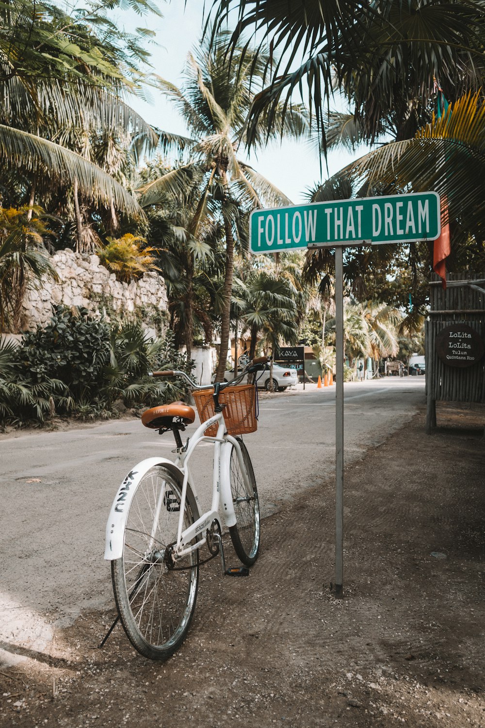 parked white bicycle