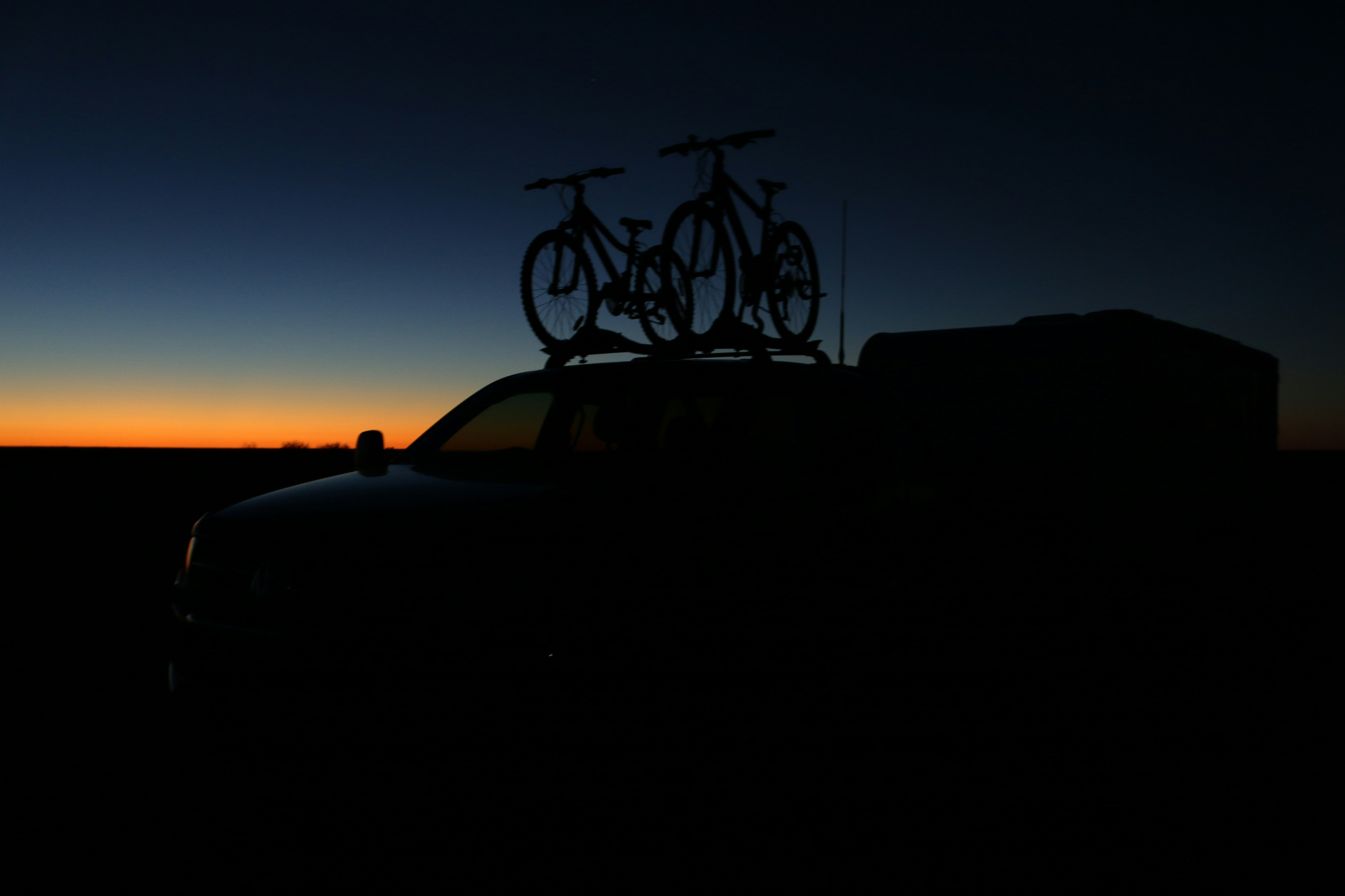 a car with two bikes on top of it