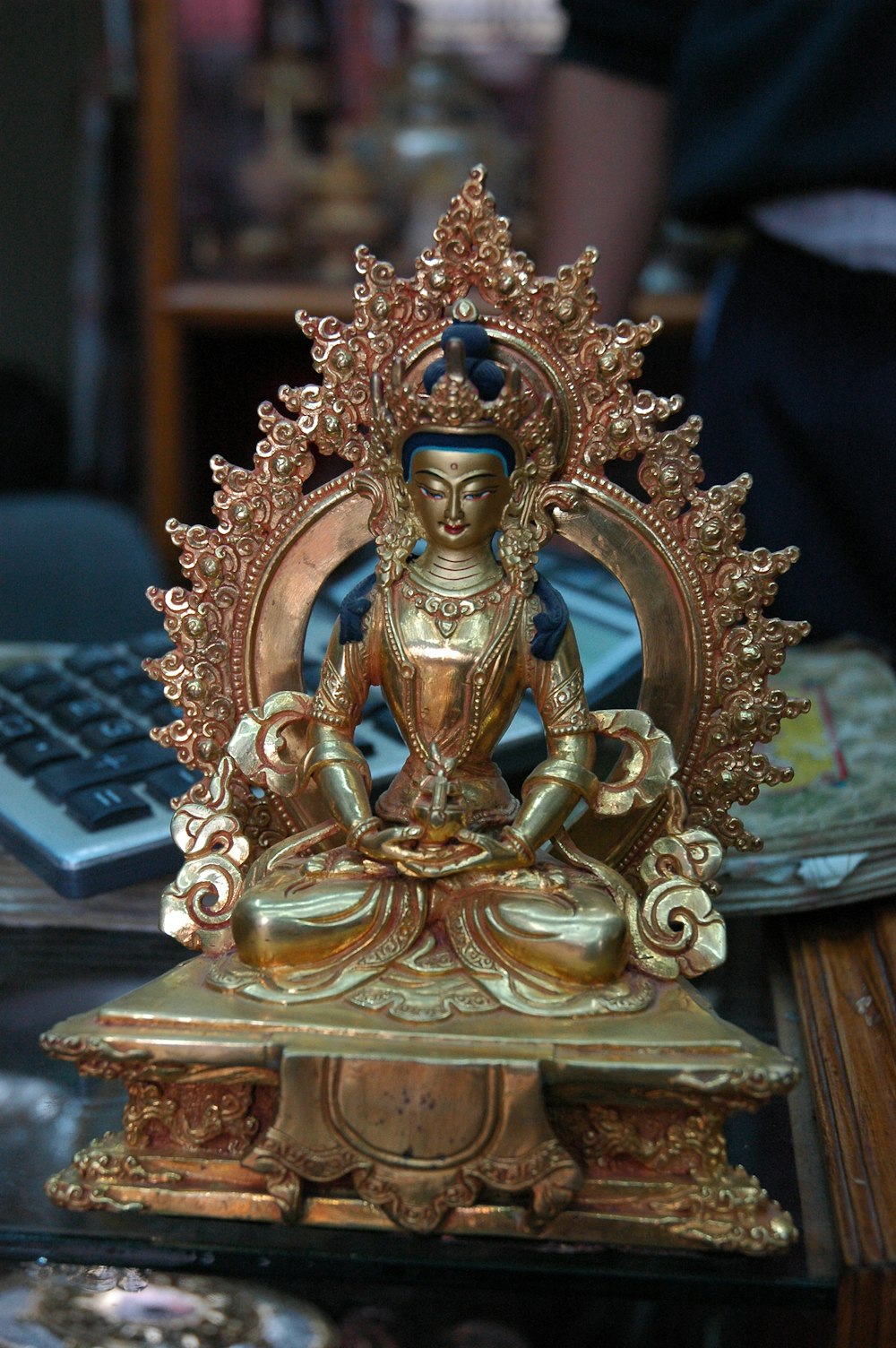 gold-colored figurine