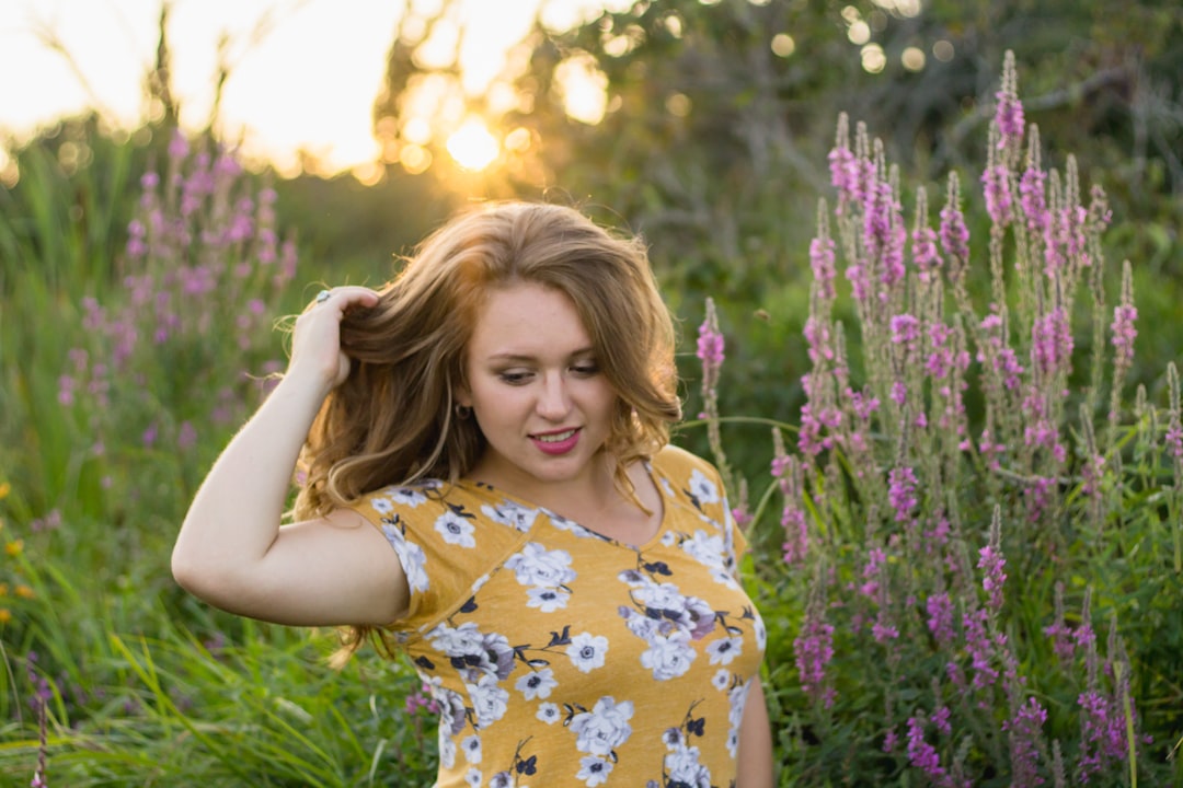 woman in yellow and white floral dress