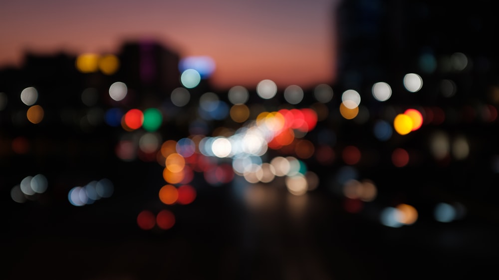 a blurry photo of a city at night