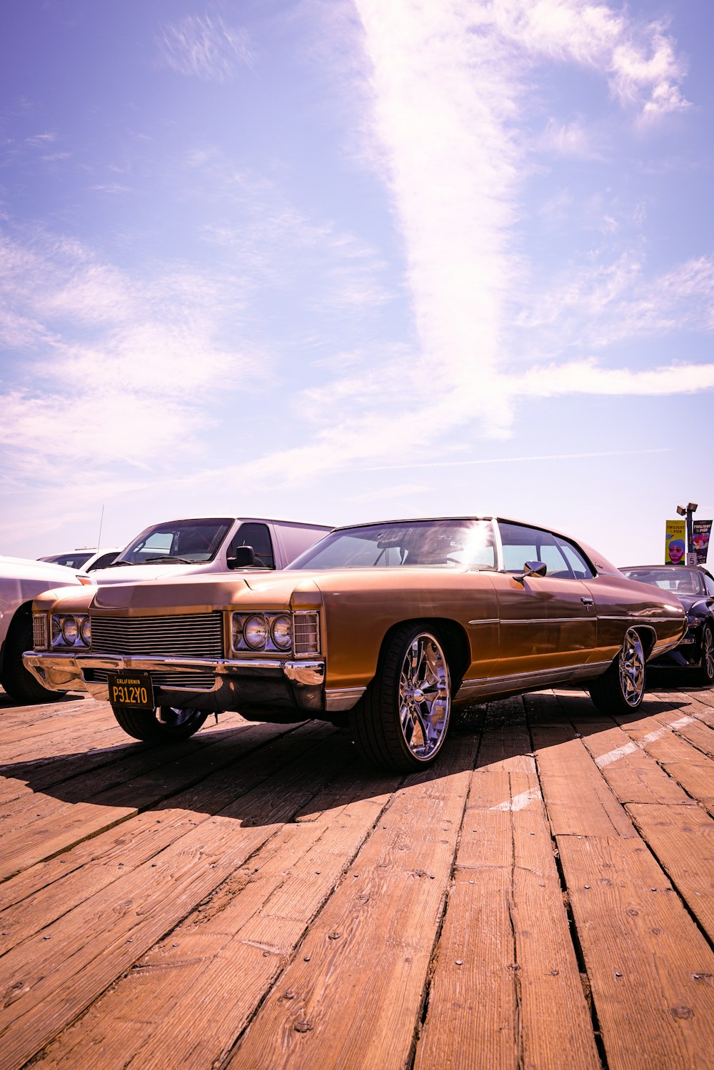 brown coupe during daytime