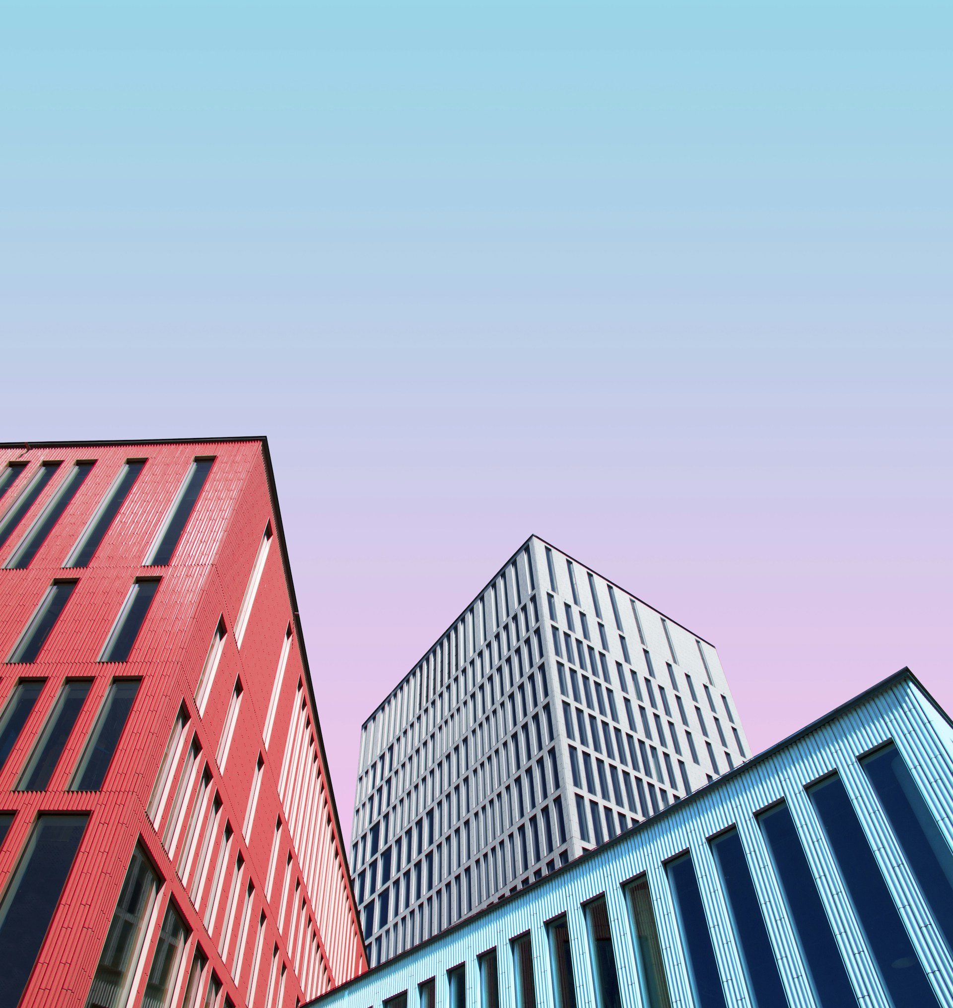 three multicolored buildings
