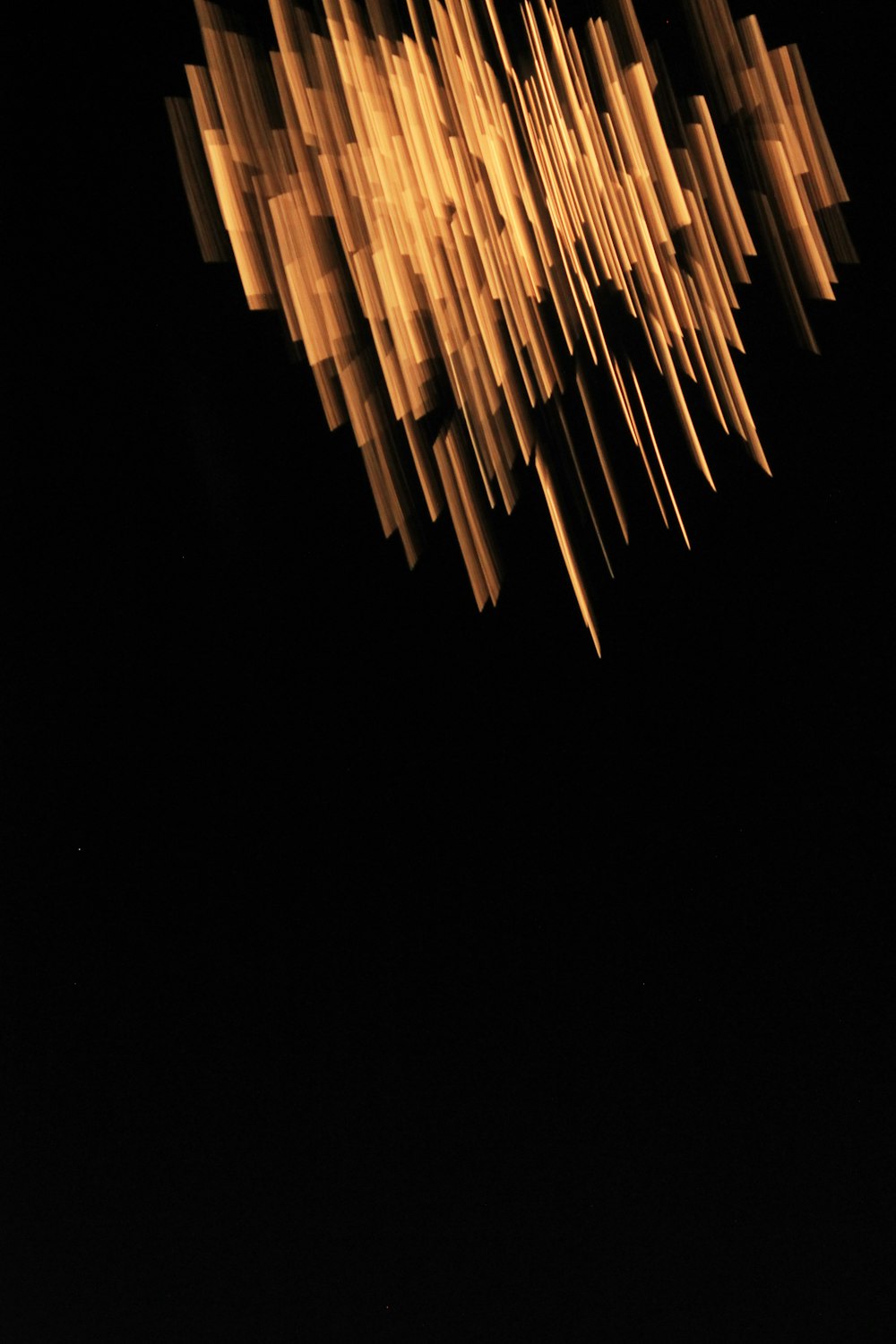 a long exposure of a plane flying in the night sky