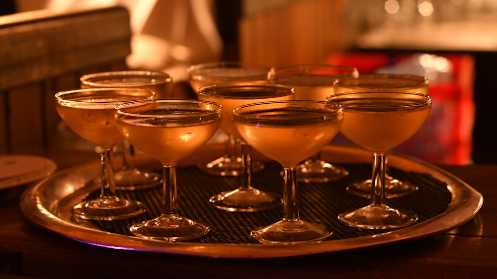 long-stem wine glasses on tray