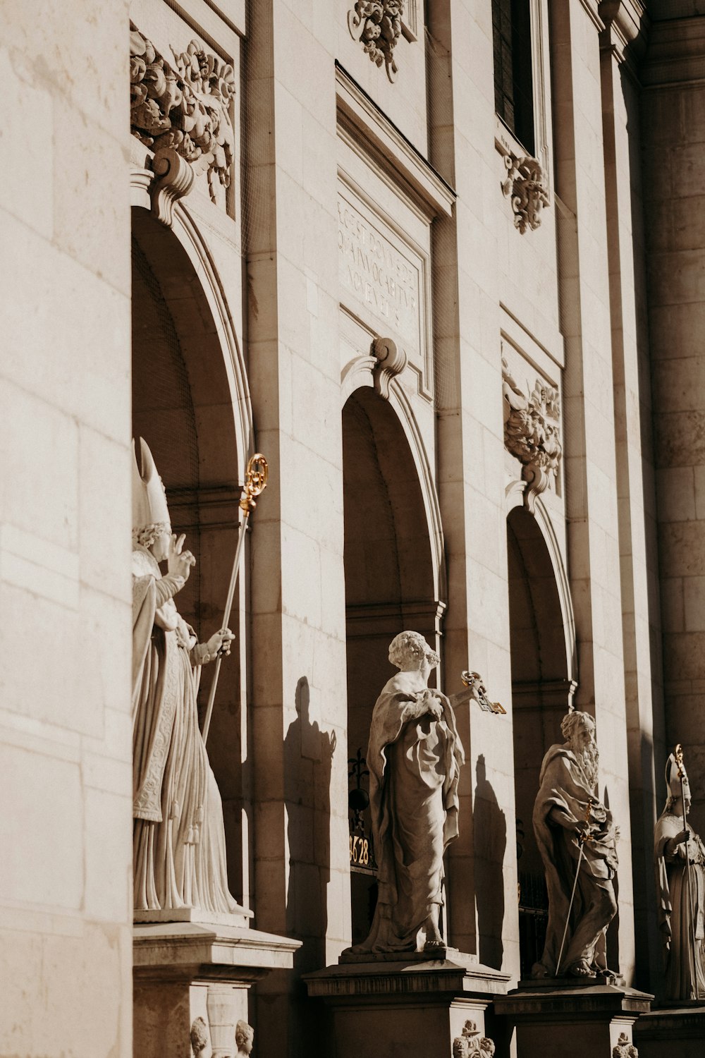 statues near building