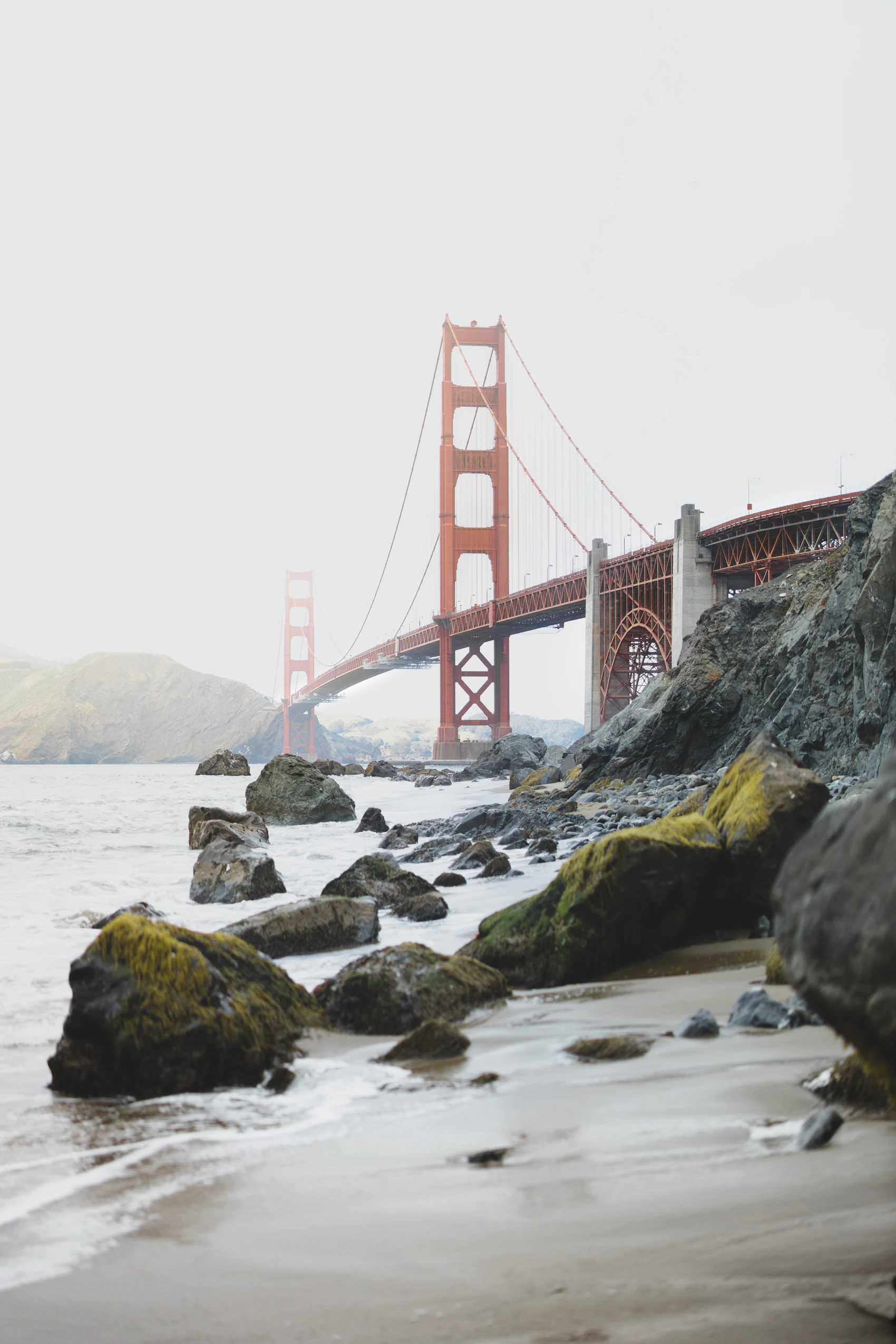 The Golden Gate Bridge rising above the San Francisco coast
