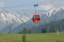 red cable car on focus photography