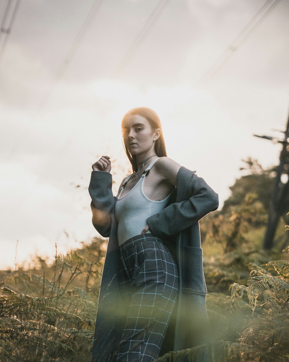 woman standing near plants