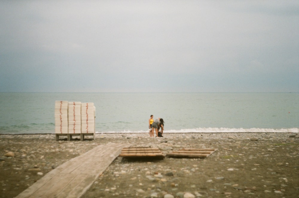 two person on seashore
