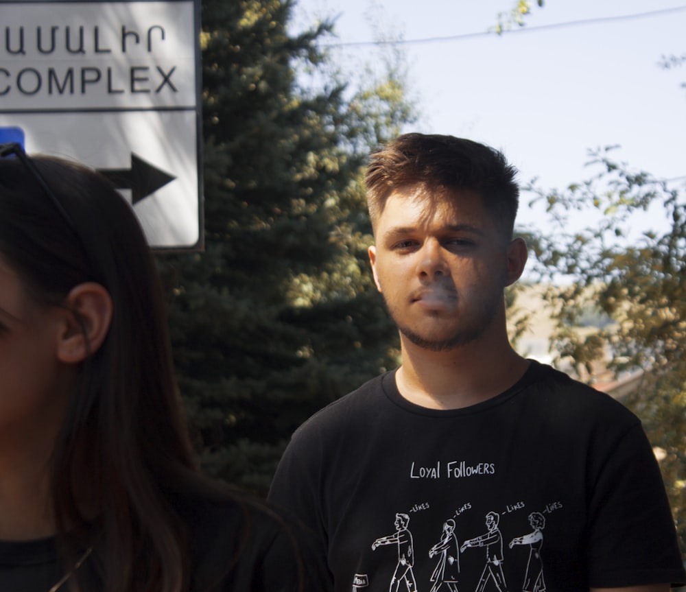 man in black crew-neck top