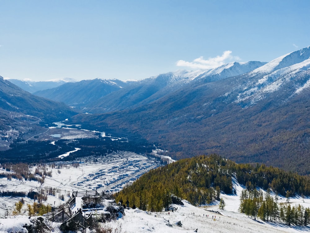 aerial photo of snow field near mountain