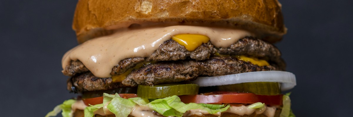 Foods That Destroy Gut Health — What to Avoid Ultra-processed foods fast food burgers that damage gut health microbiome